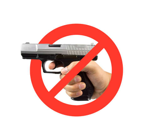 hand on a no guns sign isolated in white backgroundの写真素材