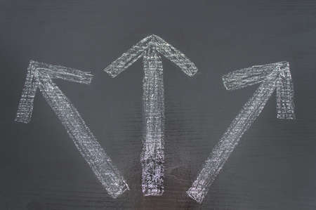 arrows indicating different paths to chooseの写真素材