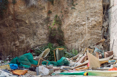 rubbish abandoned and broken furniture on the streetの写真素材
