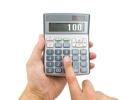 hand of a man using the calculator with white background