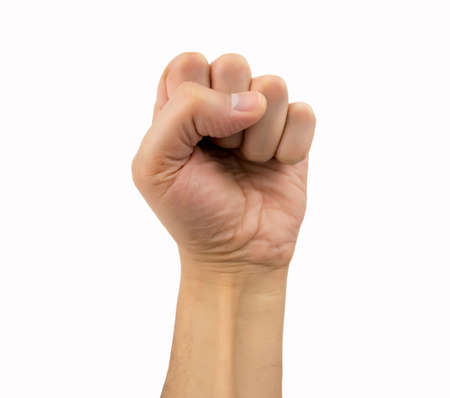 hand with the fist making the communism symbol isolated on white backgroundの写真素材