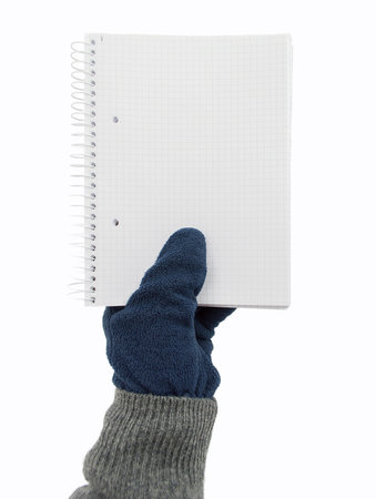 hand holding the notebook isolated on white backgroundの写真素材
