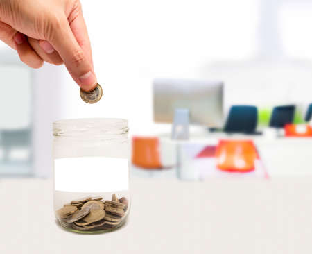 concept of a businessman saving in business officeの写真素材