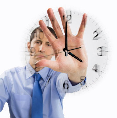 anger man making stop sign with a clock in the background like concept of deadlineの写真素材