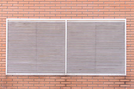 exterior view of a grating fan the building parkingの写真素材