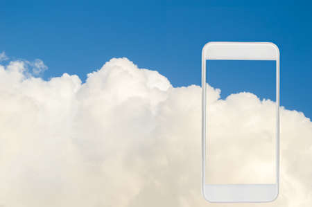 smartphone on a picture of clouds and a sky background as cloud concept internetの写真素材