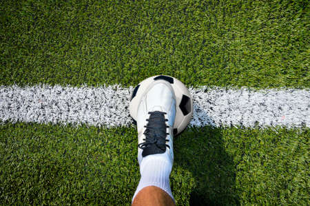 shot of a soccer player standing on the fieldの写真素材
