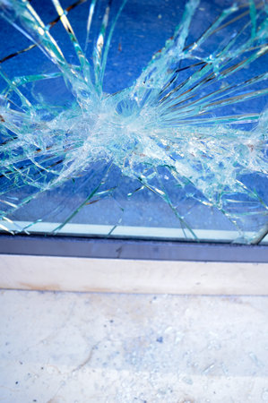 close up of broken office window glass