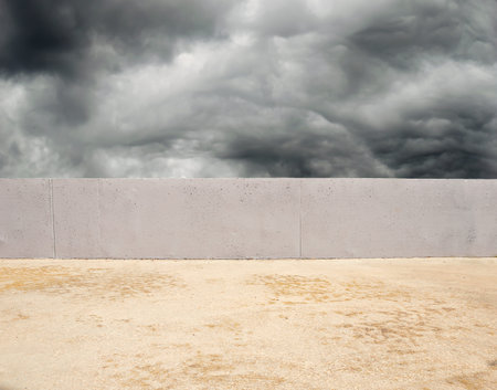 brick wall outdoors with thunderclouds in background