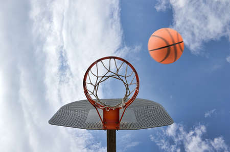 Scoring the winning points at a basketball gameの写真素材