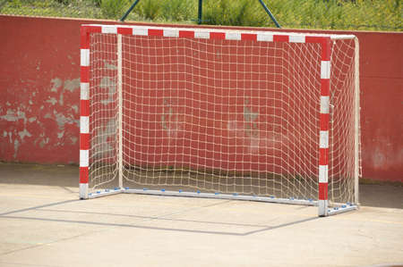 soccer and handball center court and red and white goal at schoolの写真素材