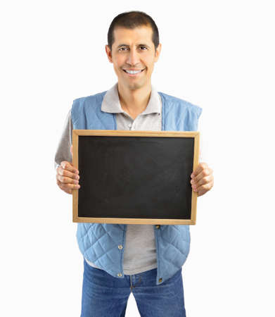 farmer holding an empty chalkboard isolated on white background の写真素材