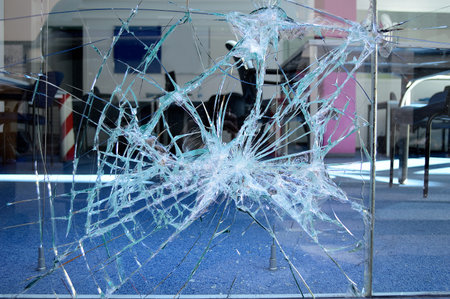 close up of broken office window glass