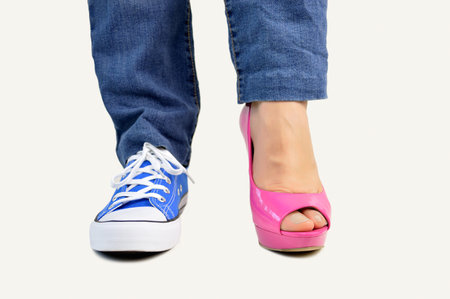 choice between feminine shoe or sneaker isolated over white background
