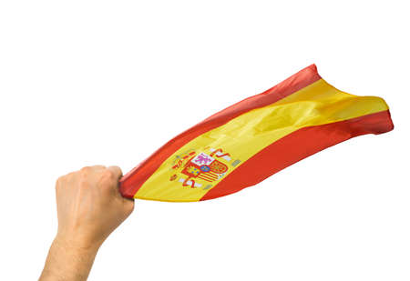 Spanish fan holding the flag of Spain isolate with white backgroundの写真素材