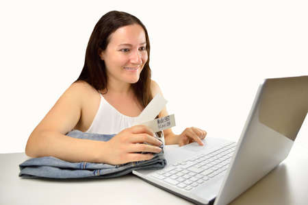 saleswoman offering her clients all the articles for sale they need isolated on white backgroundの写真素材