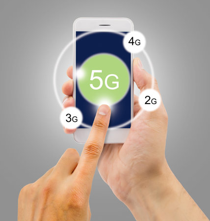person with 5g technology in the smartphone and touching the screen to connect. All screen content...