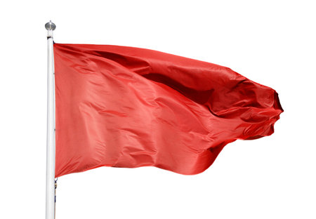 Close-up of red flag with white background