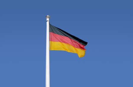 Shot of the German flag blowing in the windの写真素材
