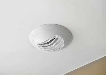 Wall electric extractor fan in the kitchenの写真素材