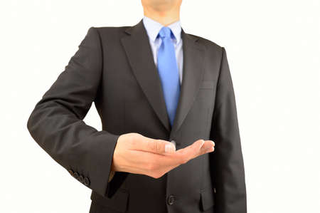 businessman with his open palm raised with copy spaceの写真素材