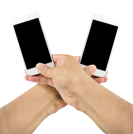 hand holding a two smart phones with white backgroundの写真素材