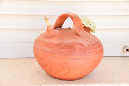 Botijo traditional clay pot jug to keep fresh water in Spain vintageの写真素材