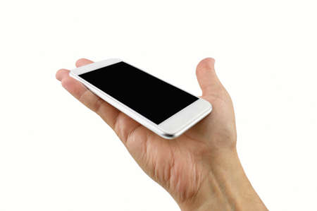 hand holding up a smart phone with a white backgroundの写真素材