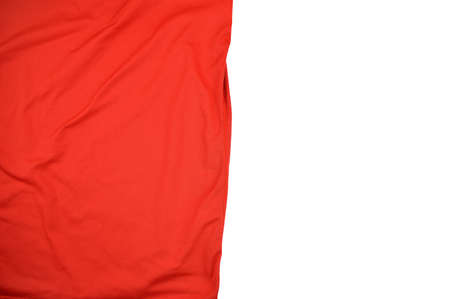 cropped photo of a red sports shirt with white background and copy spaceの写真素材