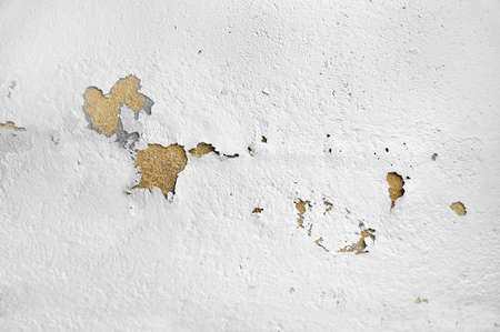 Rain water leaks on the wall causing damage and peeling paintの写真素材