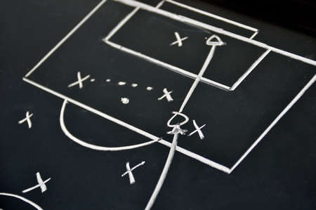 Scheme soccer or football game on blackboard backgroundの写真素材