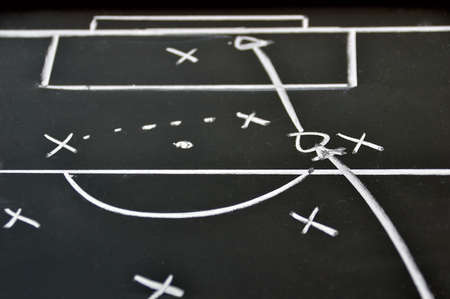 Scheme soccer or football game on blackboard backgroundの写真素材