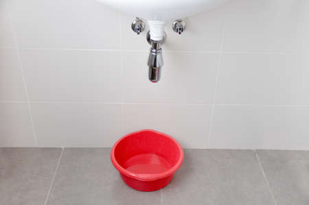 Water damage in home caused by due to clogged sanitary drainの写真素材