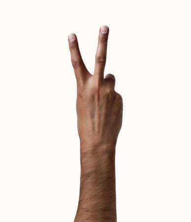 African man hand showing two fingers on a white isolated backgroundの写真素材