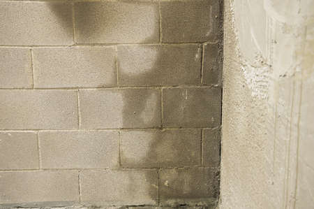 Rain water leaks on the wall causing damageの写真素材