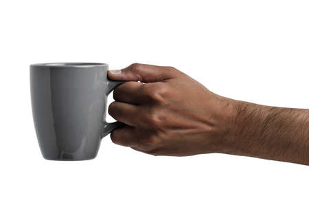 hand of an African man tossing a coin isolated on whiteの写真素材