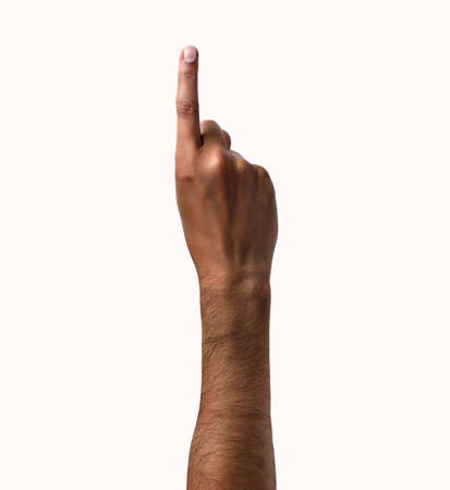 African man hand showing forefinger up tossing a coin isolated on whiteの写真素材