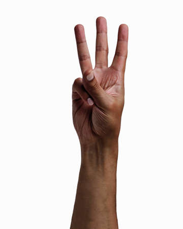 African man hand showing three fingers on a white isolated backgroundの写真素材