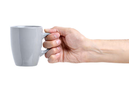 Closeup view of man holding cup isolated on whiteの写真素材