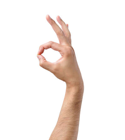 Man hand gesturing ok isolated on whiteの写真素材
