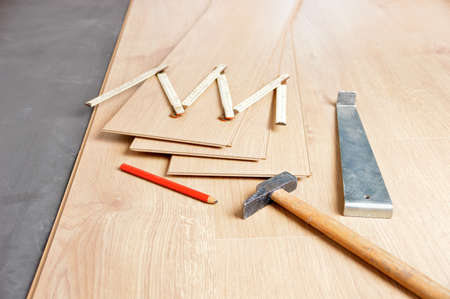 Group of tools to laying laminate at homeの写真素材
