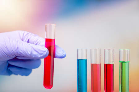 Cropped shot of scientist hand holding laboratory test tubeの写真素材