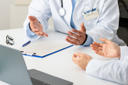 Shot of a team of doctors having a meeting in a hospitalの写真素材