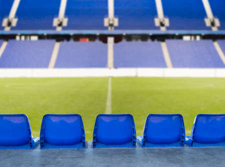 Empty football or soccer stadium - sporting events with no people or closedの写真素材