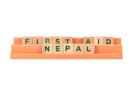 first aid nepal written with scrabble lettersの写真素材