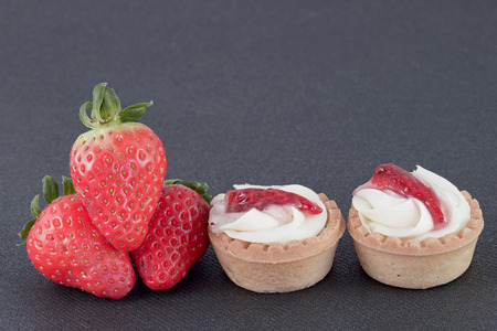 strawberry pastry and strawberries on black backgroundの写真素材