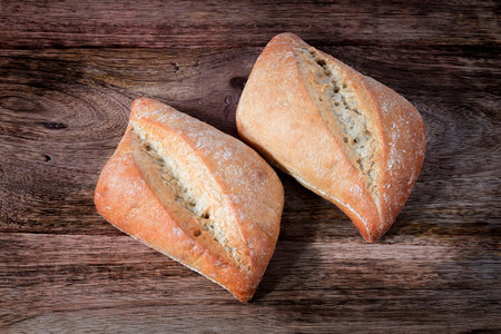 bread isolated on wooden table