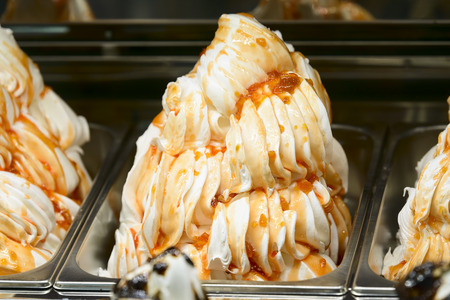 showcase of an ice cream shop with jam fruit ice creamの写真素材