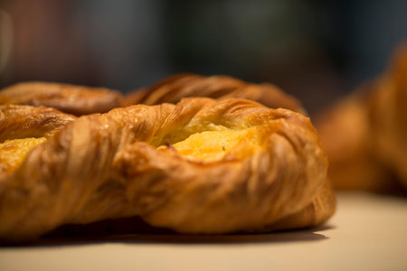 Closeup of croissants with cream in a showcase