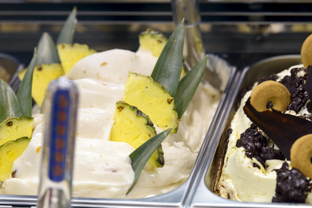 pineapple ice cream and biscuit in showcase ready for saleの写真素材